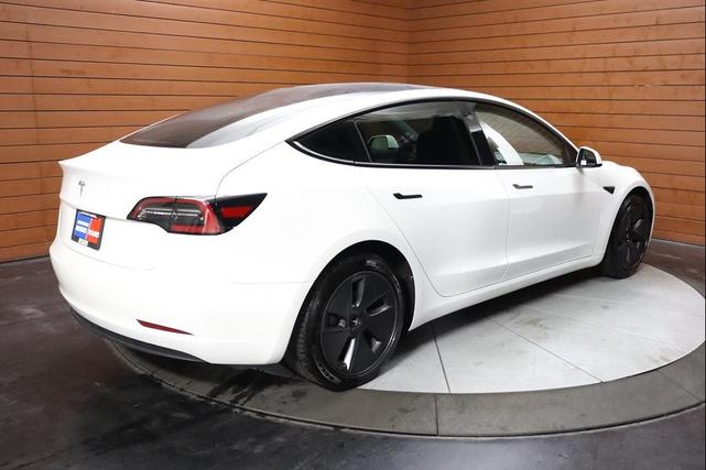 Photo of 2021 Pearl White Multi-Coat Tesla Model 3