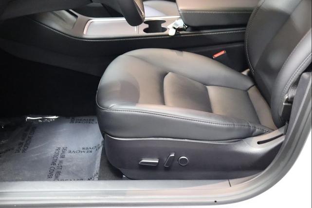 Photo of 2021 Pearl White Multi-Coat Tesla Model 3