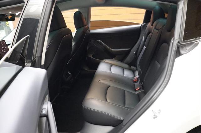 Photo of 2021 Pearl White Multi-Coat Tesla Model 3