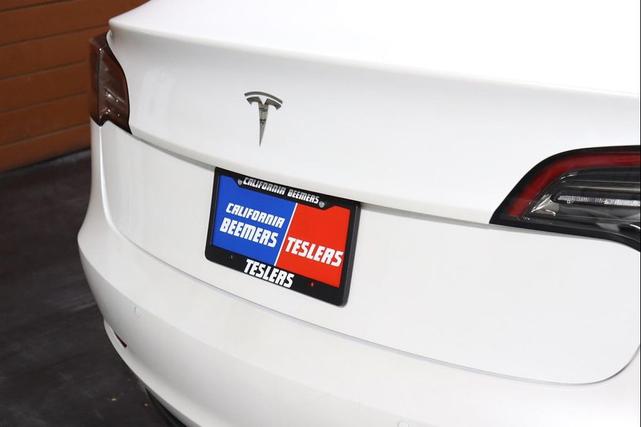 Photo of 2021 Pearl White Multi-Coat Tesla Model 3