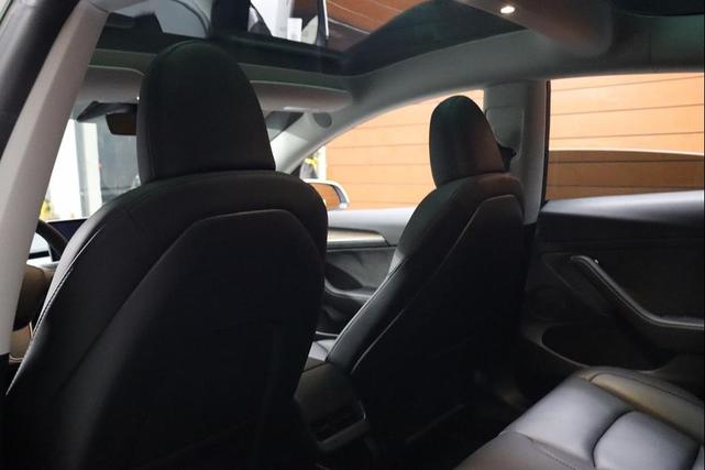 Photo of 2021 Pearl White Multi-Coat Tesla Model 3