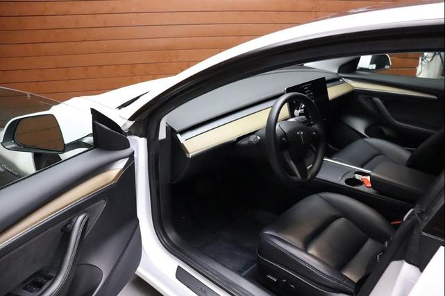 Photo of 2021 Pearl White Multi-Coat Tesla Model 3
