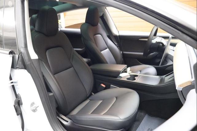 Photo of 2021 Pearl White Multi-Coat Tesla Model 3