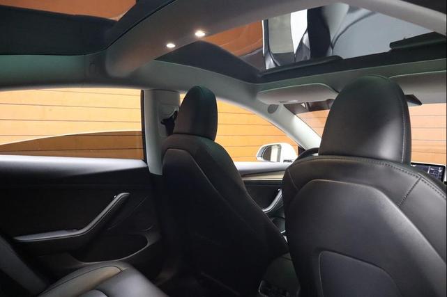 Photo of 2021 Pearl White Multi-Coat Tesla Model 3