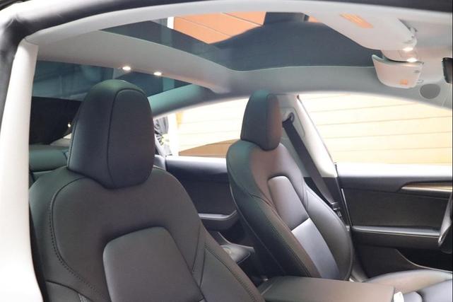 Photo of 2021 Pearl White Multi-Coat Tesla Model 3