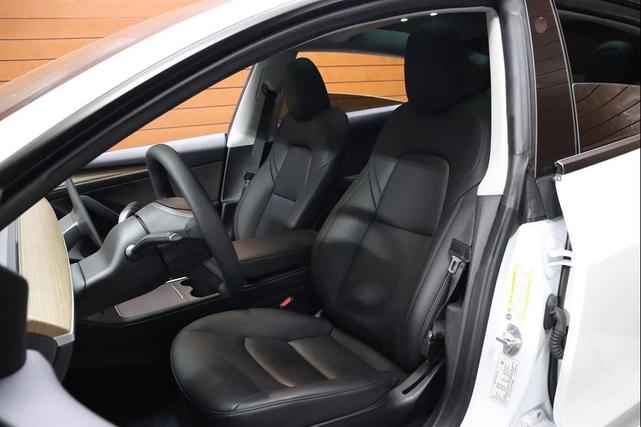 Photo of 2021 Pearl White Multi-Coat Tesla Model 3