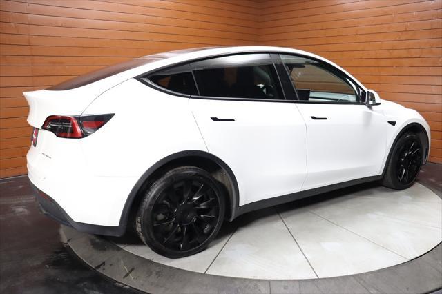 Photo of 2023 Pearl White Multi-Coat Tesla Model Y