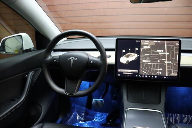 Photo of 2021 Pearl White Multi-Coat Tesla Model Y