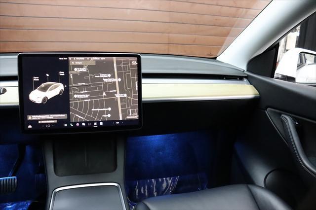 Photo of 2021 Pearl White Multi-Coat Tesla Model Y