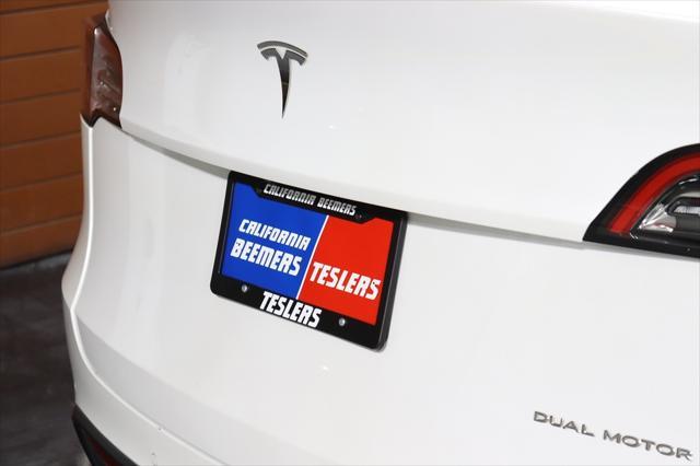 Photo of 2021 Pearl White Multi-Coat Tesla Model Y