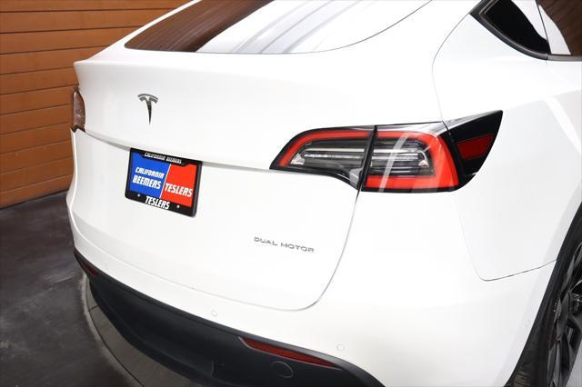 Photo of 2021 Pearl White Multi-Coat Tesla Model Y