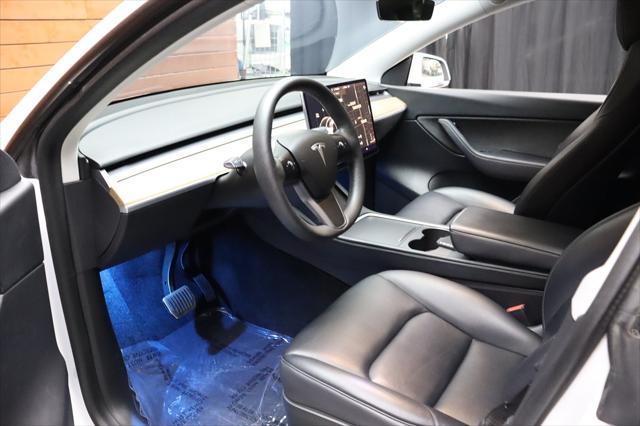 Photo of 2021 Pearl White Multi-Coat Tesla Model Y
