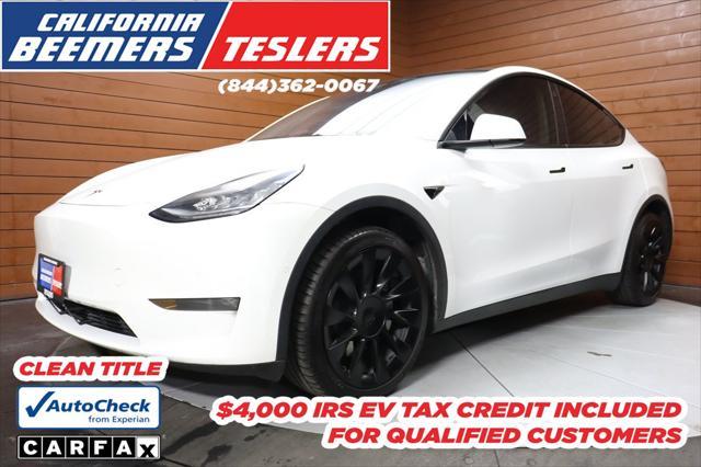 Photo of 2021 Pearl White Multi-Coat Tesla Model Y