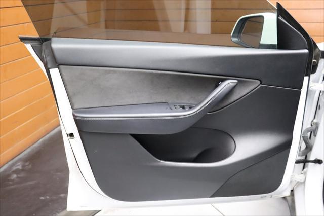 Photo of 2021 Pearl White Multi-Coat Tesla Model Y
