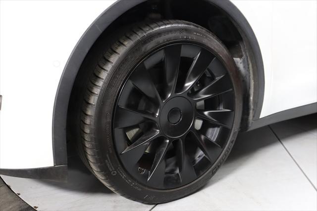 Photo of 2021 Pearl White Multi-Coat Tesla Model Y