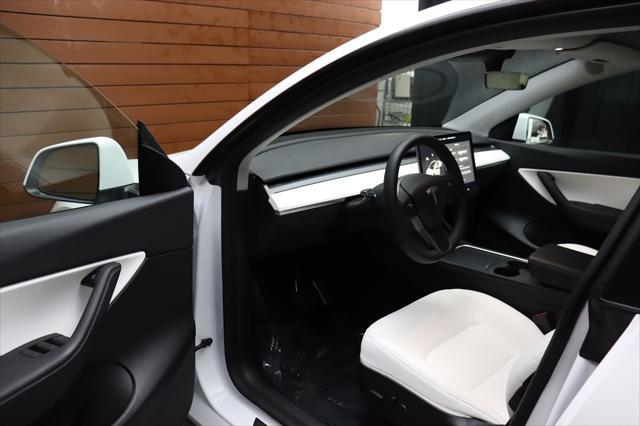 Photo of 2022 Pearl White Multi-Coat Tesla Model Y