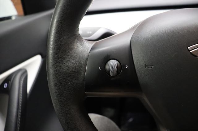 Photo of 2022 Pearl White Multi-Coat Tesla Model Y