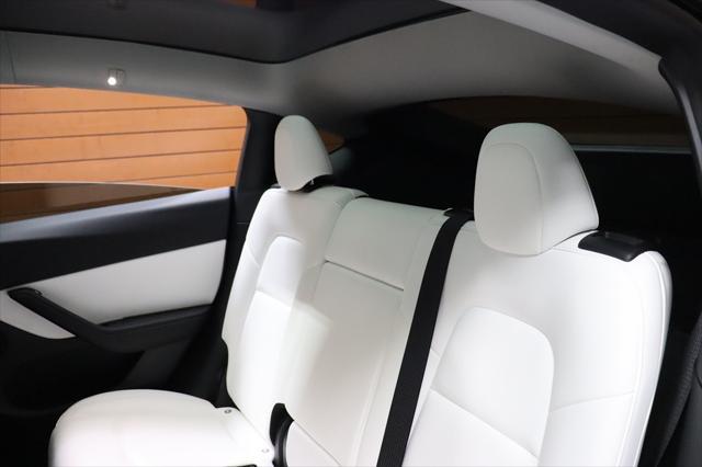 Photo of 2022 Pearl White Multi-Coat Tesla Model Y