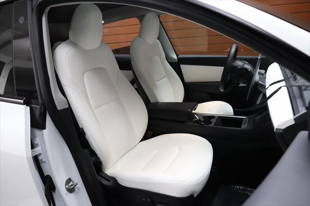 Photo of 2022 Pearl White Multi-Coat Tesla Model Y