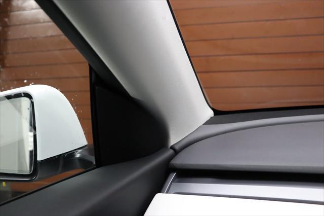 Photo of 2022 Pearl White Multi-Coat Tesla Model Y