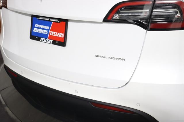 Photo of 2022 Pearl White Multi-Coat Tesla Model Y