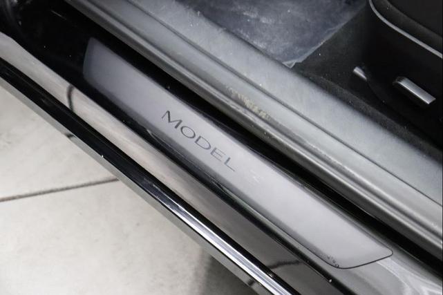 Photo of 2022 Solid Black Tesla Model 3