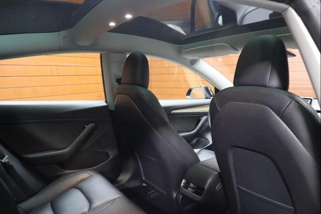 Photo of 2022 Solid Black Tesla Model 3