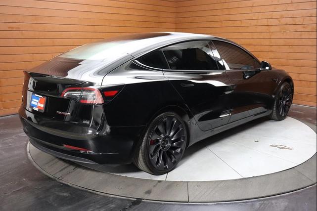 Photo of 2022 Solid Black Tesla Model 3
