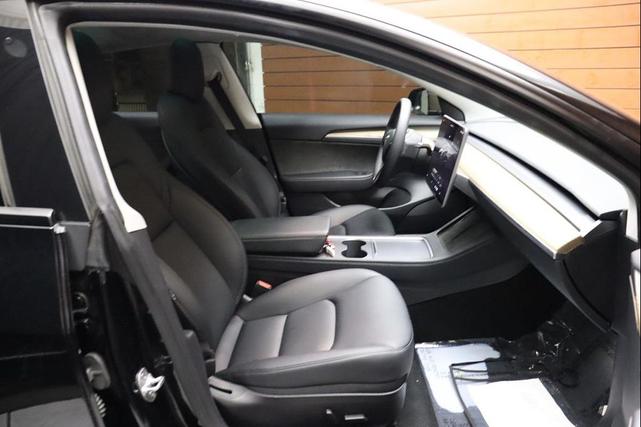 Photo of 2022 Solid Black Tesla Model 3