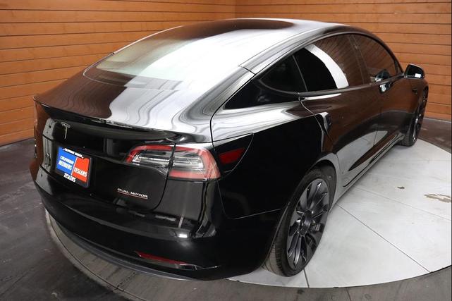 Photo of 2022 Solid Black Tesla Model 3
