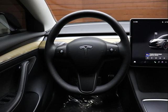 Photo of 2022 Solid Black Tesla Model 3
