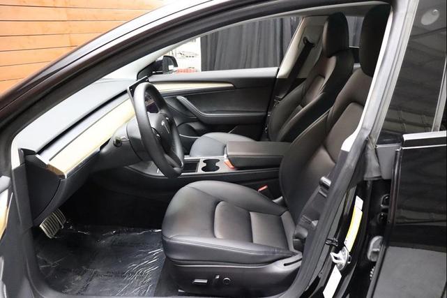 Photo of 2022 Solid Black Tesla Model 3
