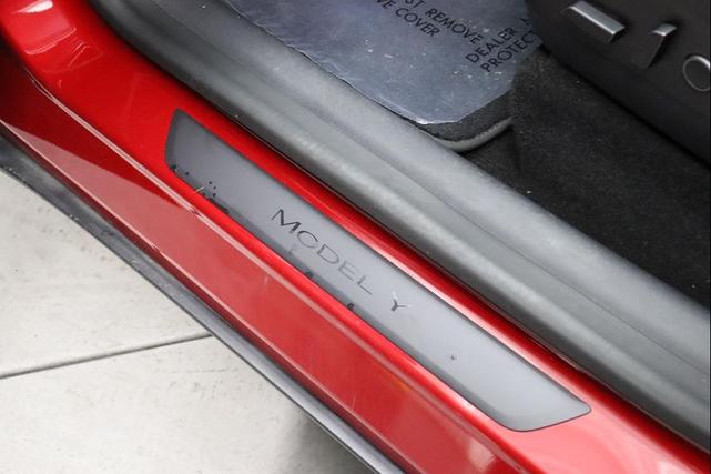 Photo of 2021 Red Multi-Coat Tesla Model Y