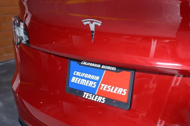 Photo of 2022 Red Multi-Coat Tesla Model Y