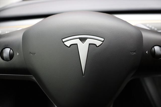 Photo of 2022 Red Multi-Coat Tesla Model Y