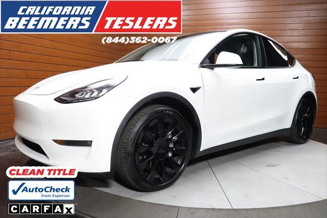 Photo of 2021 Pearl White Multi-Coat Tesla Model Y