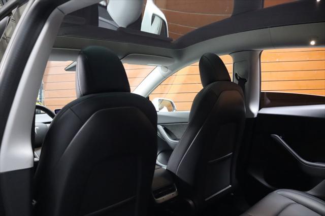 Photo of 2021 Pearl White Multi-Coat Tesla Model Y