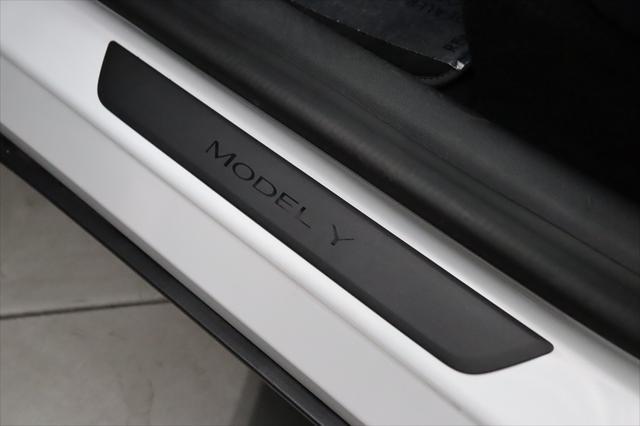 Photo of 2021 Pearl White Multi-Coat Tesla Model Y