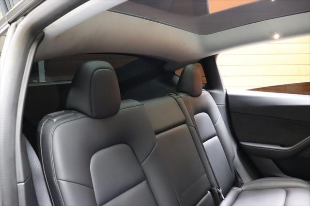 Photo of 2021 Pearl White Multi-Coat Tesla Model Y