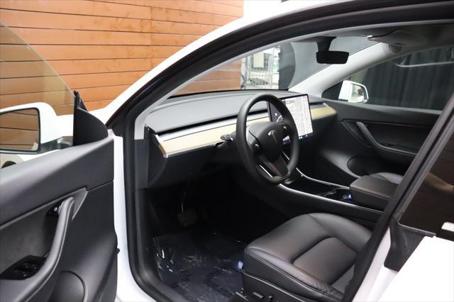 Photo of 2021 Pearl White Multi-Coat Tesla Model Y