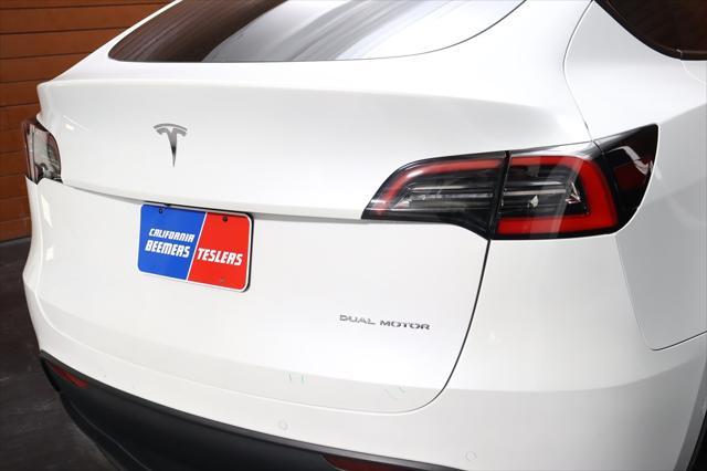 Photo of 2021 Pearl White Multi-Coat Tesla Model Y