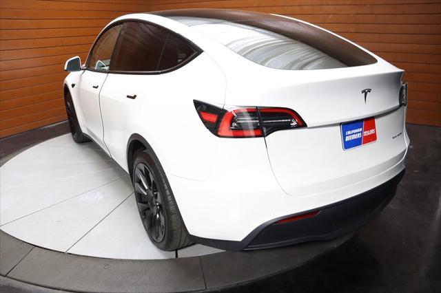 Photo of 2021 Pearl White Multi-Coat Tesla Model Y