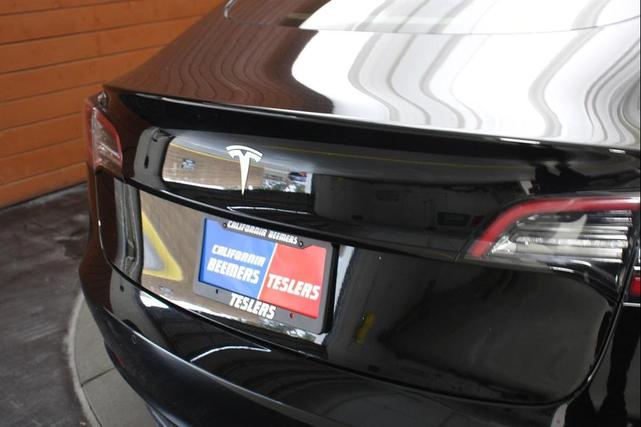Photo of 2021 Solid Black Tesla Model 3