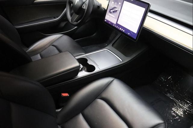 Photo of 2021 Solid Black Tesla Model 3