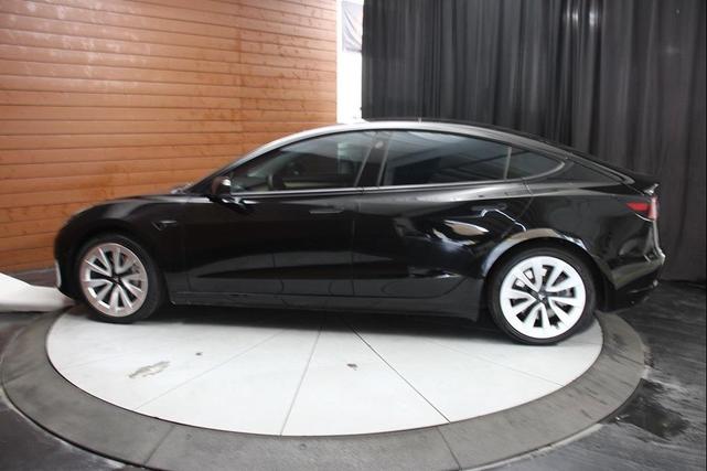 Photo of 2021 Solid Black Tesla Model 3