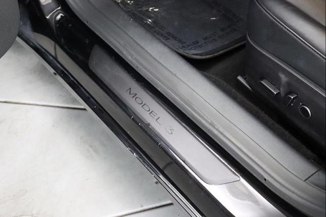 Photo of 2021 Solid Black Tesla Model 3