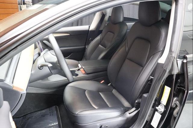 Photo of 2021 Solid Black Tesla Model 3
