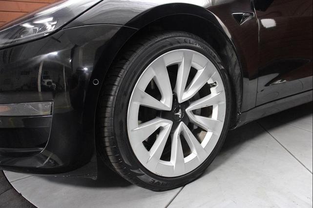 Photo of 2021 Solid Black Tesla Model 3