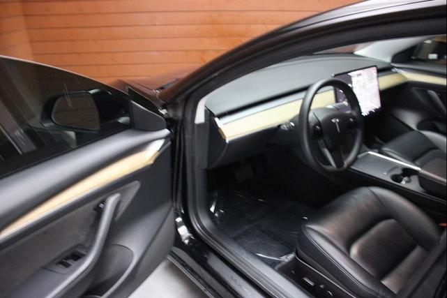 Photo of 2021 Solid Black Tesla Model 3