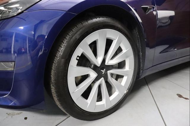 Photo of 2022 Deep Blue Metallic Tesla Model 3